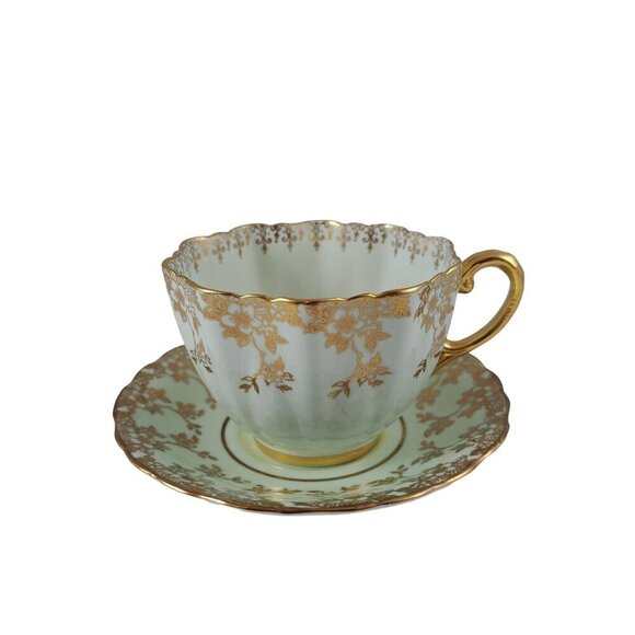 Paragon Bone China Tea Cup Saucer Pale Blue Green Gold Floral Accents Vintage